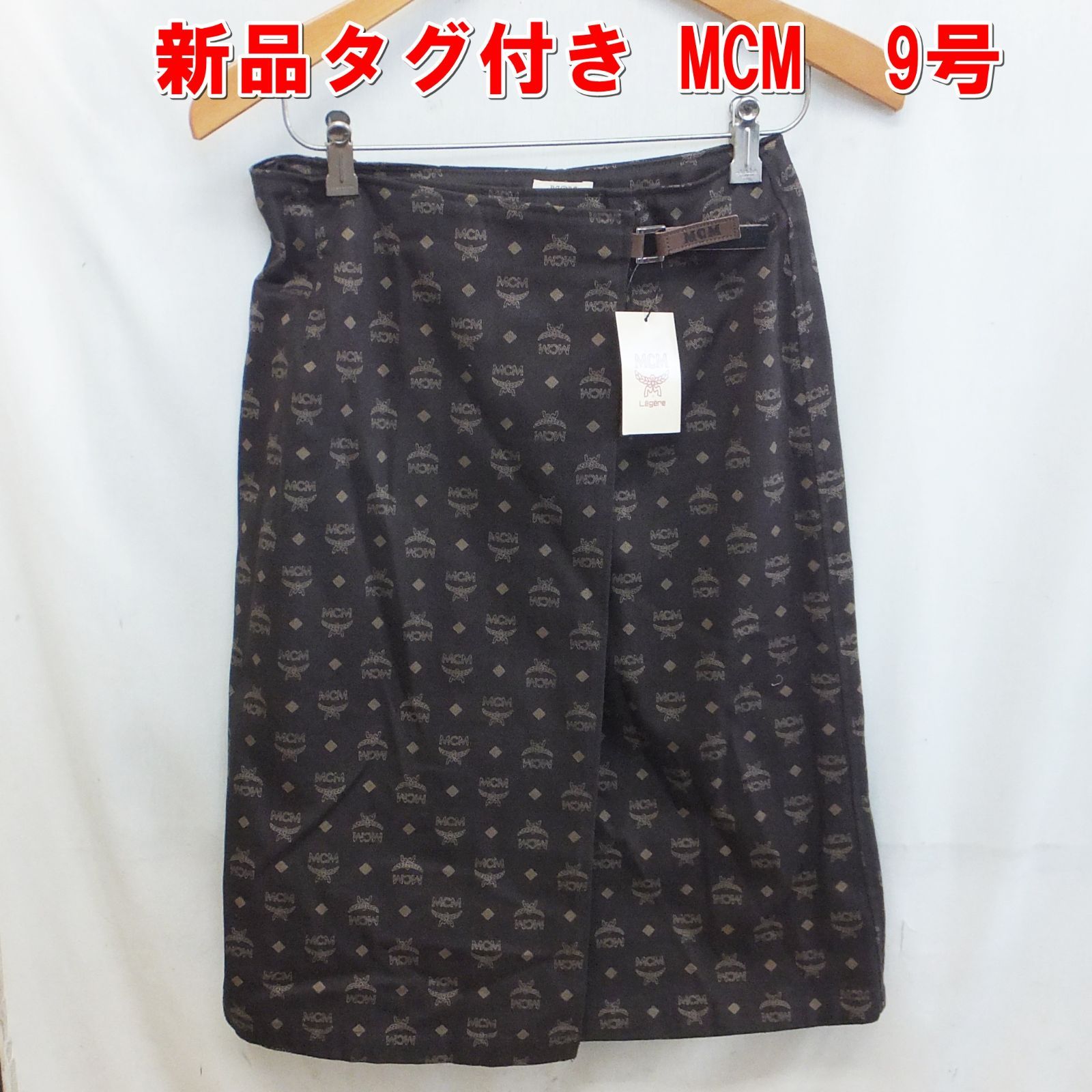S171【新品タグ付き】エムシーエム（MCM）総柄　ヴィセトス柄　膝丈ラップスカート　9号　/10