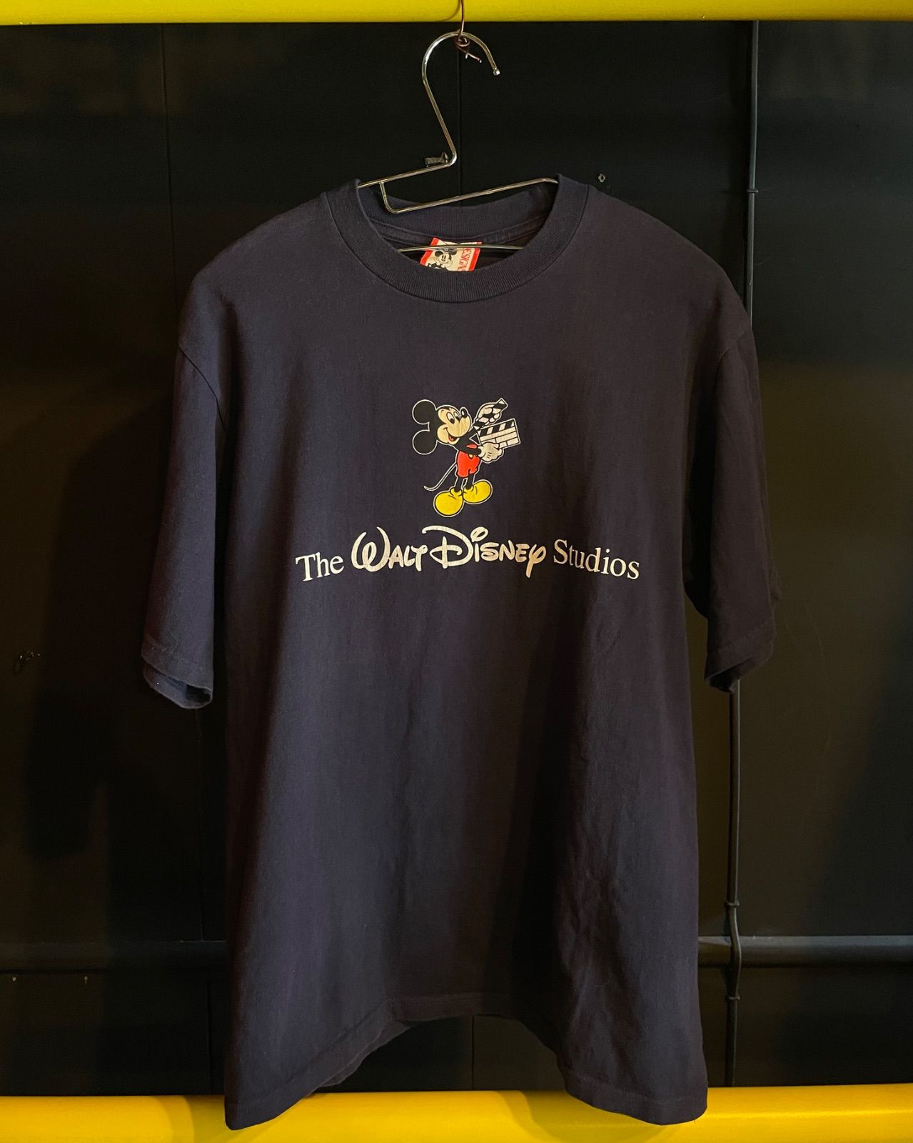 90s Disney DESIGNS(The Walt Disney Studios)Tシャツ(ネイビー・M・USA製) 1