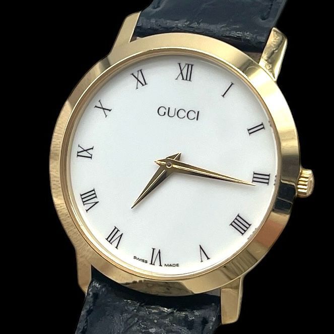 新品電池稼働品 GUCCI グッチ メンズ腕時計 2200M ラウンド型 クォーツQZ ゴールド 文字盤ホワイト ベルト ブラック レザー スイス製