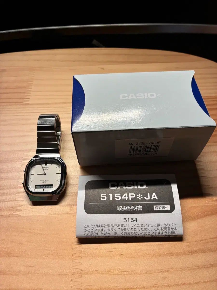 カシオ aq240e アイボリー シルバー ニューカラー