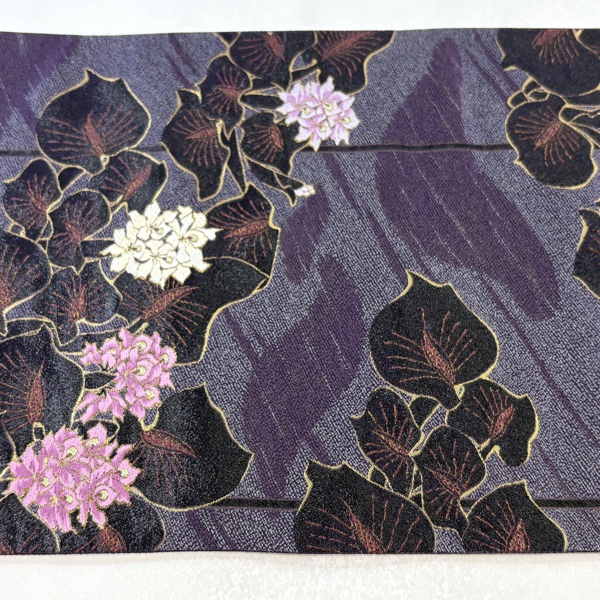 美品】 袋帯 逸品 じゅらく 落款 草花 箔 紫 六通 正絹 【中古】
