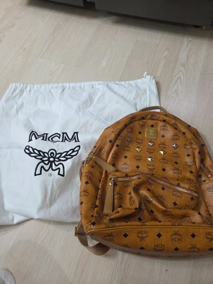 MCM バックパック ブラウン + ダストバッグ