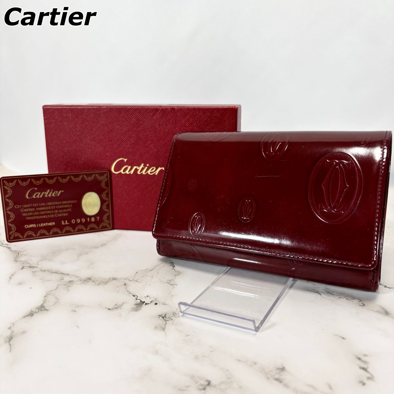 カルティエ Cartier 二つ折財布 ハッピーバースデー ロゴ型押し エナメルレザー 箱付き ギャランティカード付き L3000347