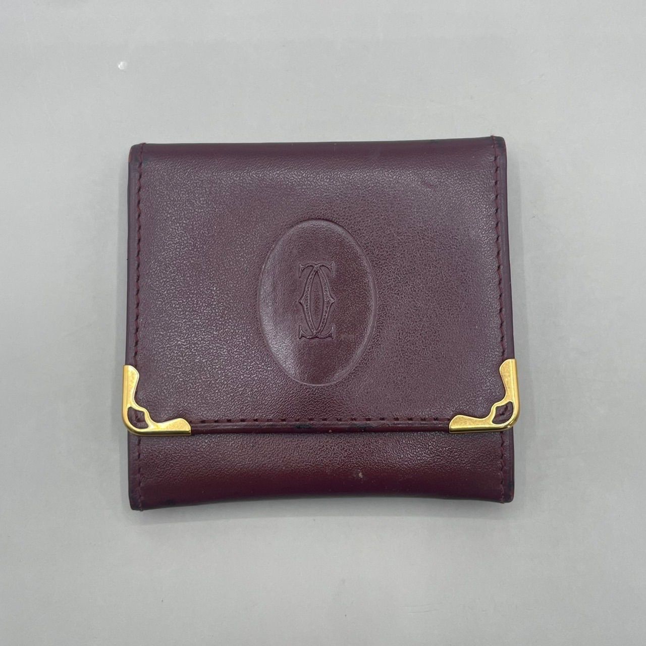 Cartier カルティエ　小銭入れ　コインケース　二層　マストライン　ロゴ型押し　ゴールド金具　レザー　ボルドー