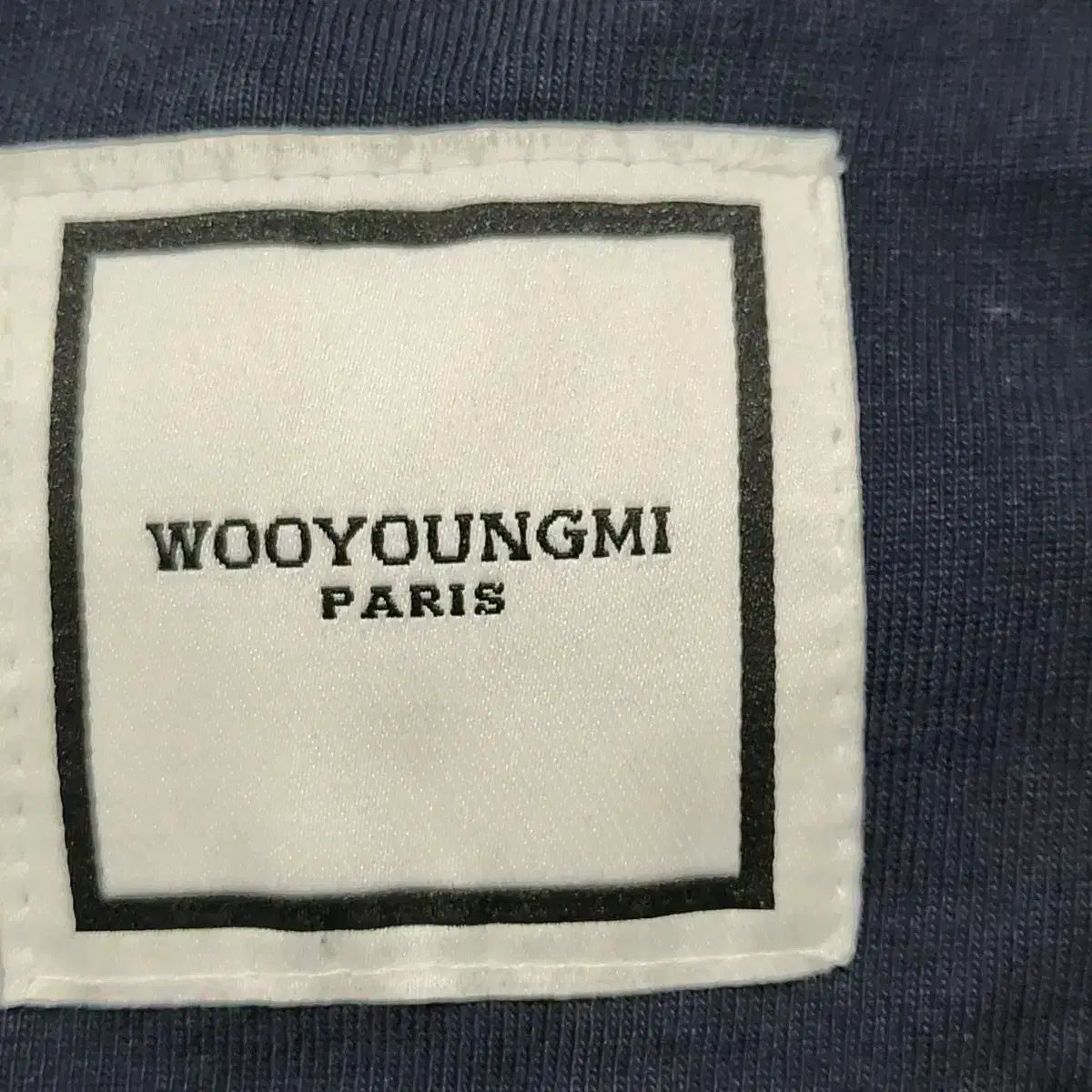 ウーヨンミ(WOOYOUNGMI) ナビ プリンティング 半袖 Tシャツ ブラック ウーヨンミ(WOOYOUNGMI) ナビ プリンティング 半袖 Tシャツ ブラック
