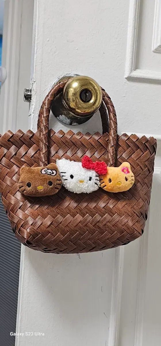 ハローキティ ファー ぬいぐるみ ブラウン 編み込み バッグ