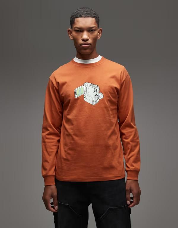 グラミチ レディース トップス Tシャツ Gramicci camcorder long sleeve Tshirt in burnt orangeオレンジ