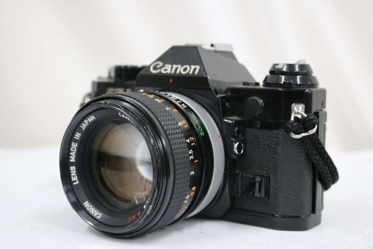 【返品保証】 キャノン Canon AE-1 PROGRAM ブラック FD 50mm F1.4 SSC ボディレンズセット e12142