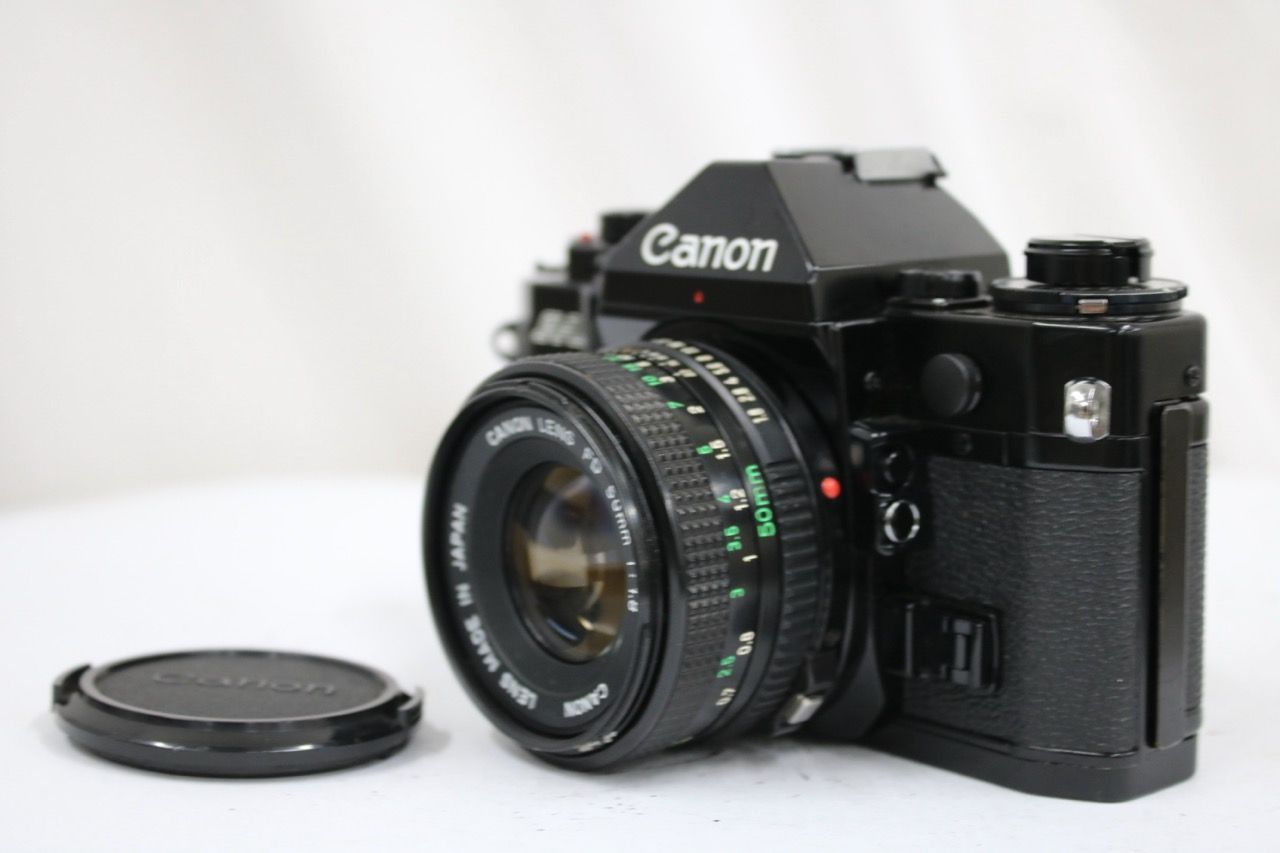 【返品保証】 キャノン Canon A-1 NEW FD 50mm F1.8 ボディレンズセット e12180