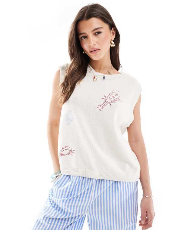エイソス レディース トップス タンクトップ 刺繍 ニット ASOS DESIGN knit embroidered fish and shell tank top in ecru Ecru エクリュ