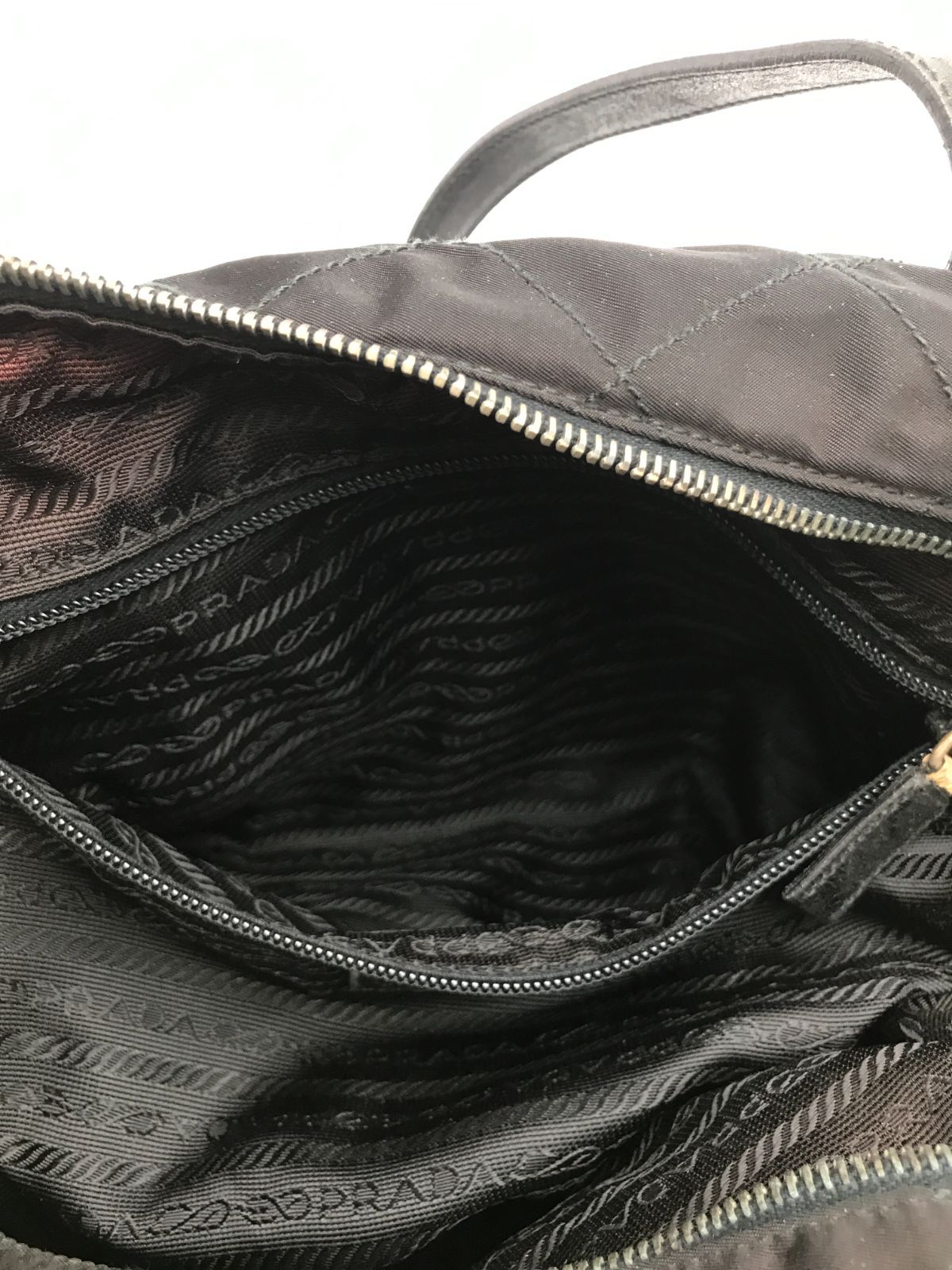 PRADA　プラダ　ショルダーバッグ　キルティング　三角ロゴ　テスートナイロン×レザー　ブラック系　肩掛け　1920
