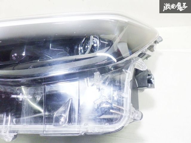 ヤリスクロス ハイブリッド MXPJ10 左ヘッドランプ 81150-52N20