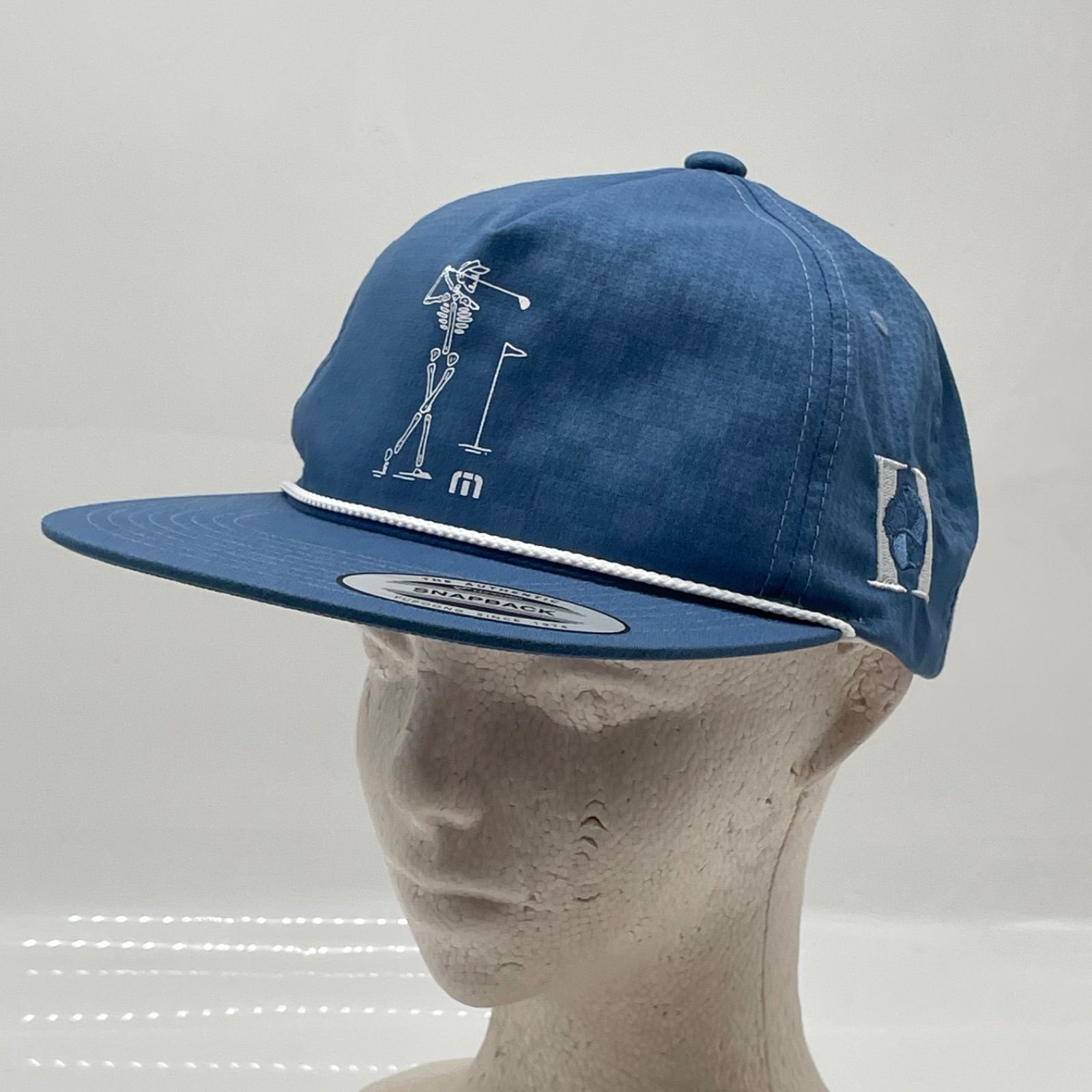 KO4185□TRAVIS MATHEW トラビスマシュー キャップ ゴルフ スナップバック ブルー系 ドクロ 未使用