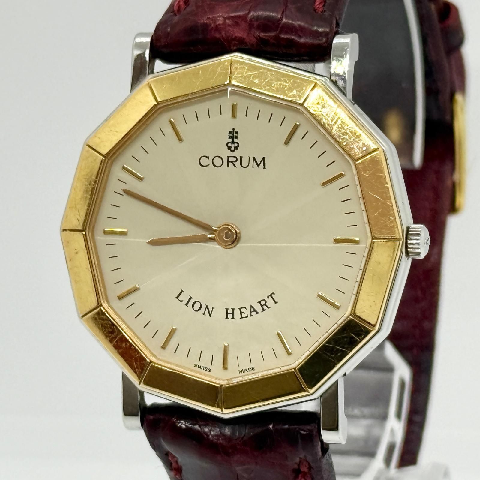 CORUM コルム ライオンハート 64.801.21 ベージュ QZ メンズ YG 腕時計 
