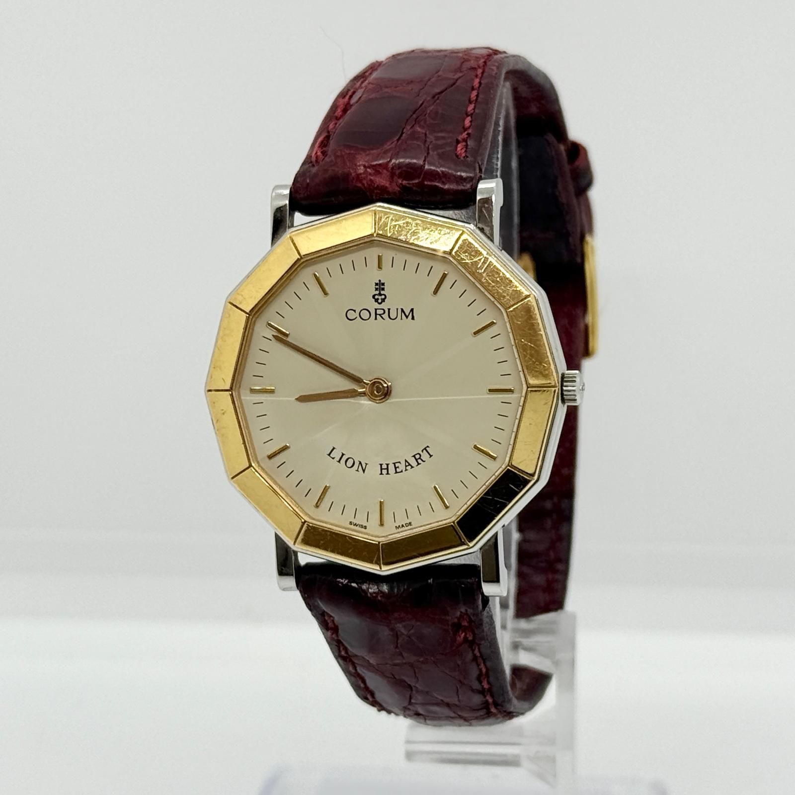 CORUM コルム ライオンハート 64.801.21 ベージュ QZ メンズ YG 腕時計 