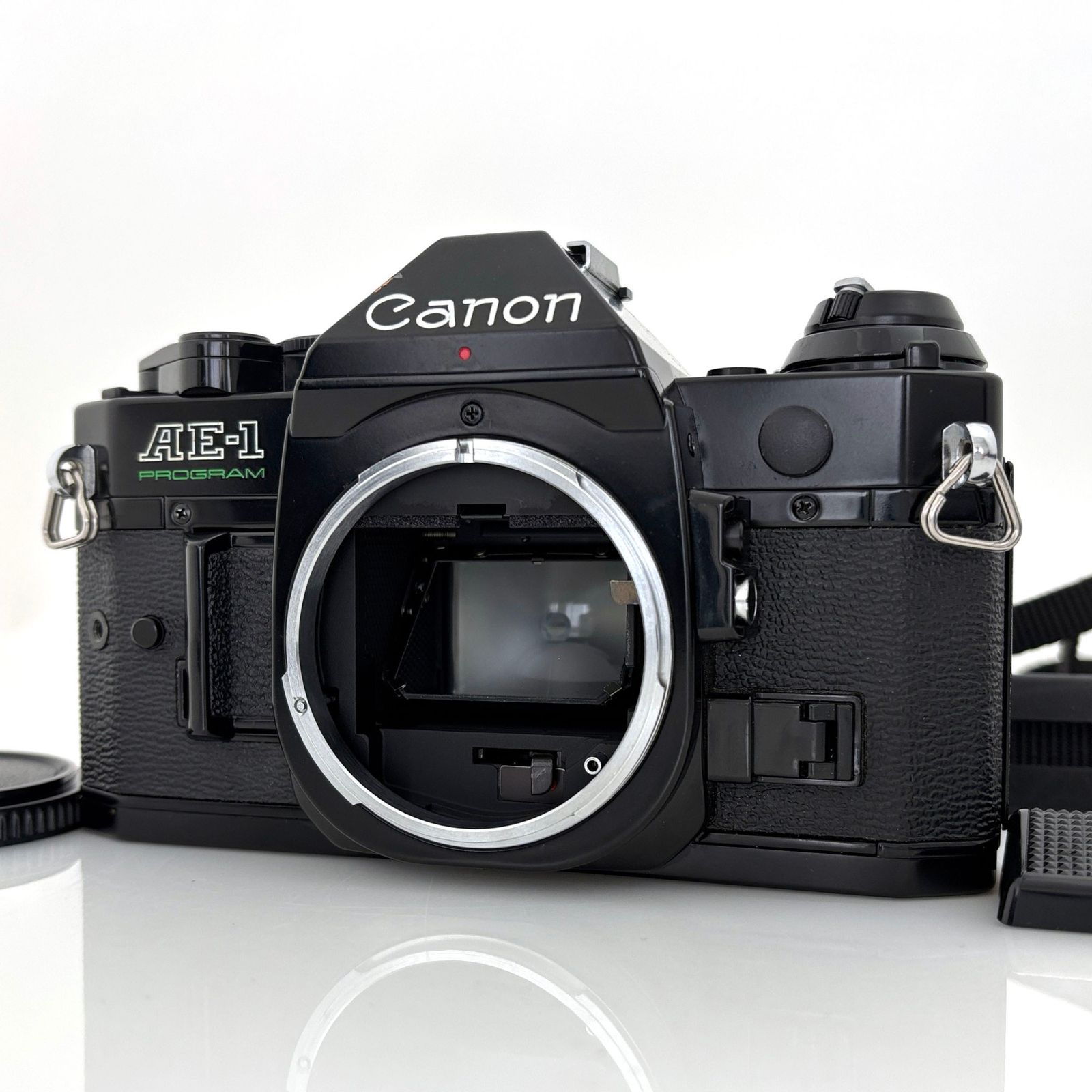 整備済 Canon AE-1 Program 黒 鳴き無 完動品 純正ストラップ キヤノン】CANON AE-1 Program ブラック フィルム一眼レフ ストラップ