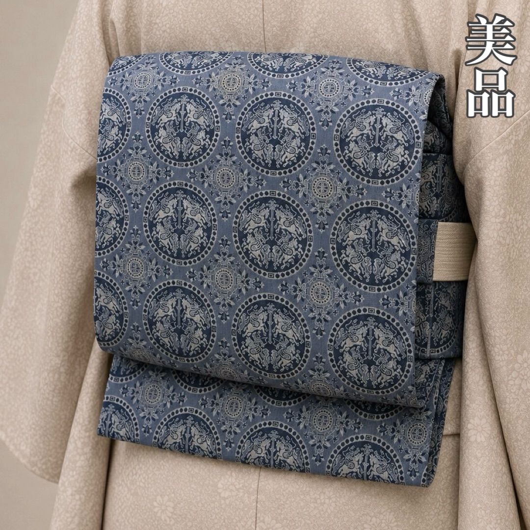 J797 美品 名古屋帯 九寸 綴織 狩猟文 正絹 薄花色 和装 和服 - メルカリ