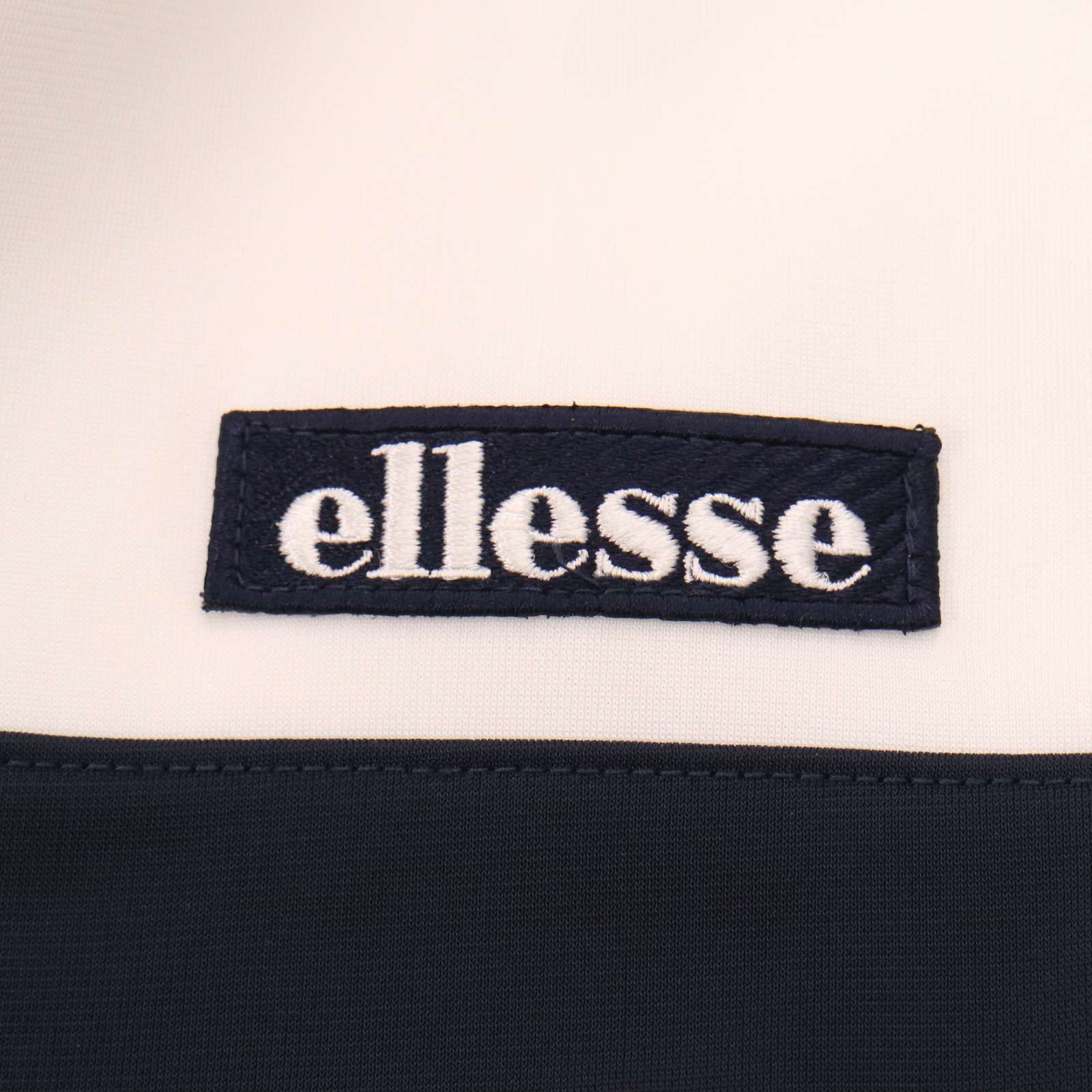 ellesse エレッセ 通年☆ ロゴ刺繍 切替 ワッペン ジャージ トラック 