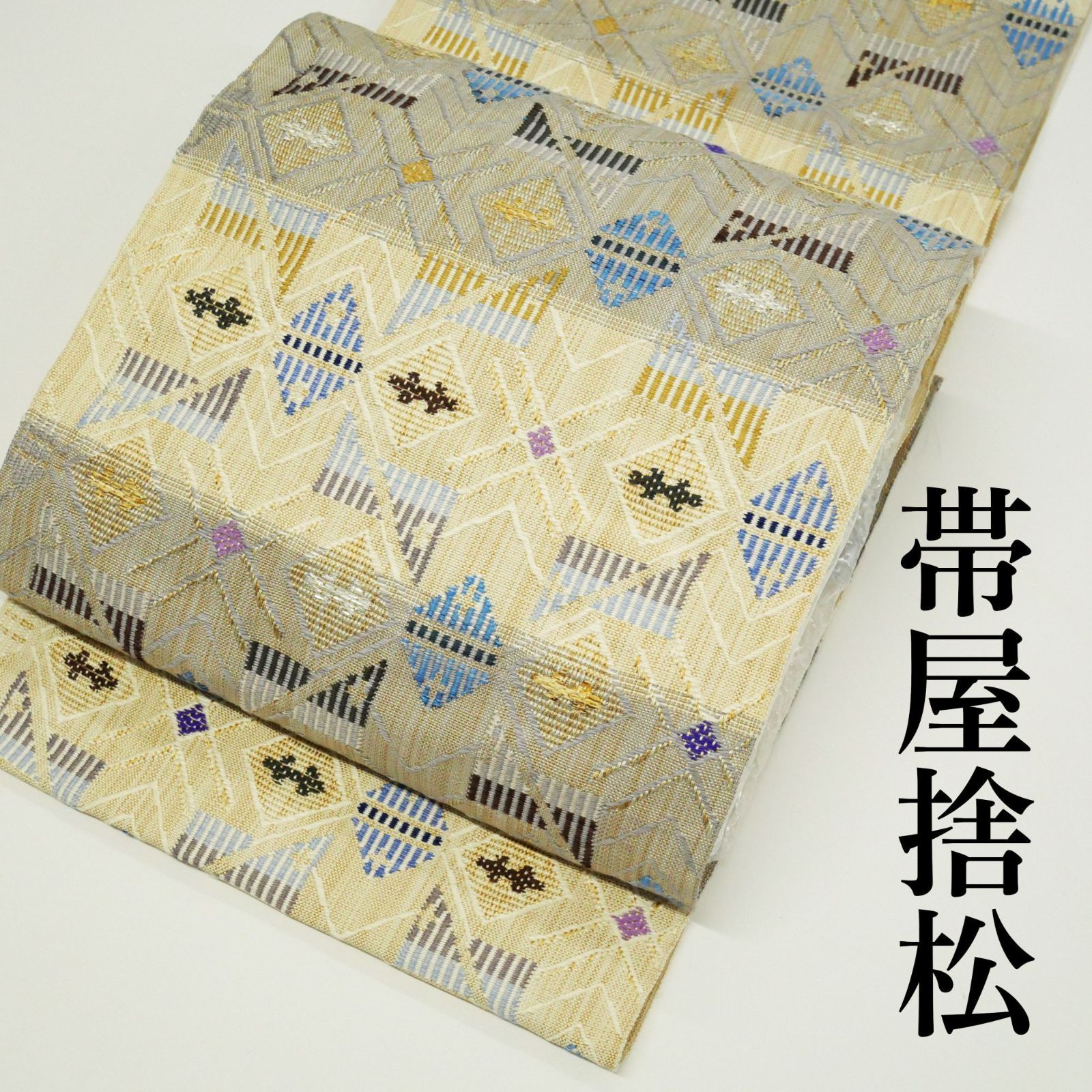 ※お仕立て代金込み【新品・未仕立て】｜帯屋捨松（おびやすてまつ）｜正絹｜西陣織｜八寸名古屋帯｜組織地織｜六通柄 51,840円