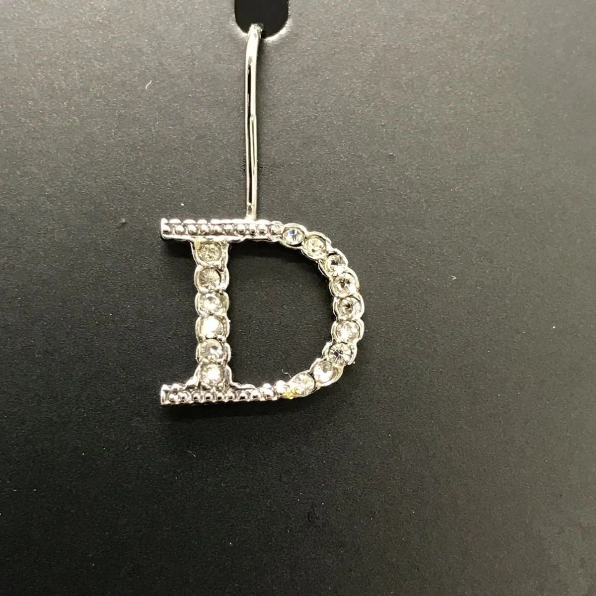 Christian Dior ディオール ピアス フック式 ロゴモチーフ ライン