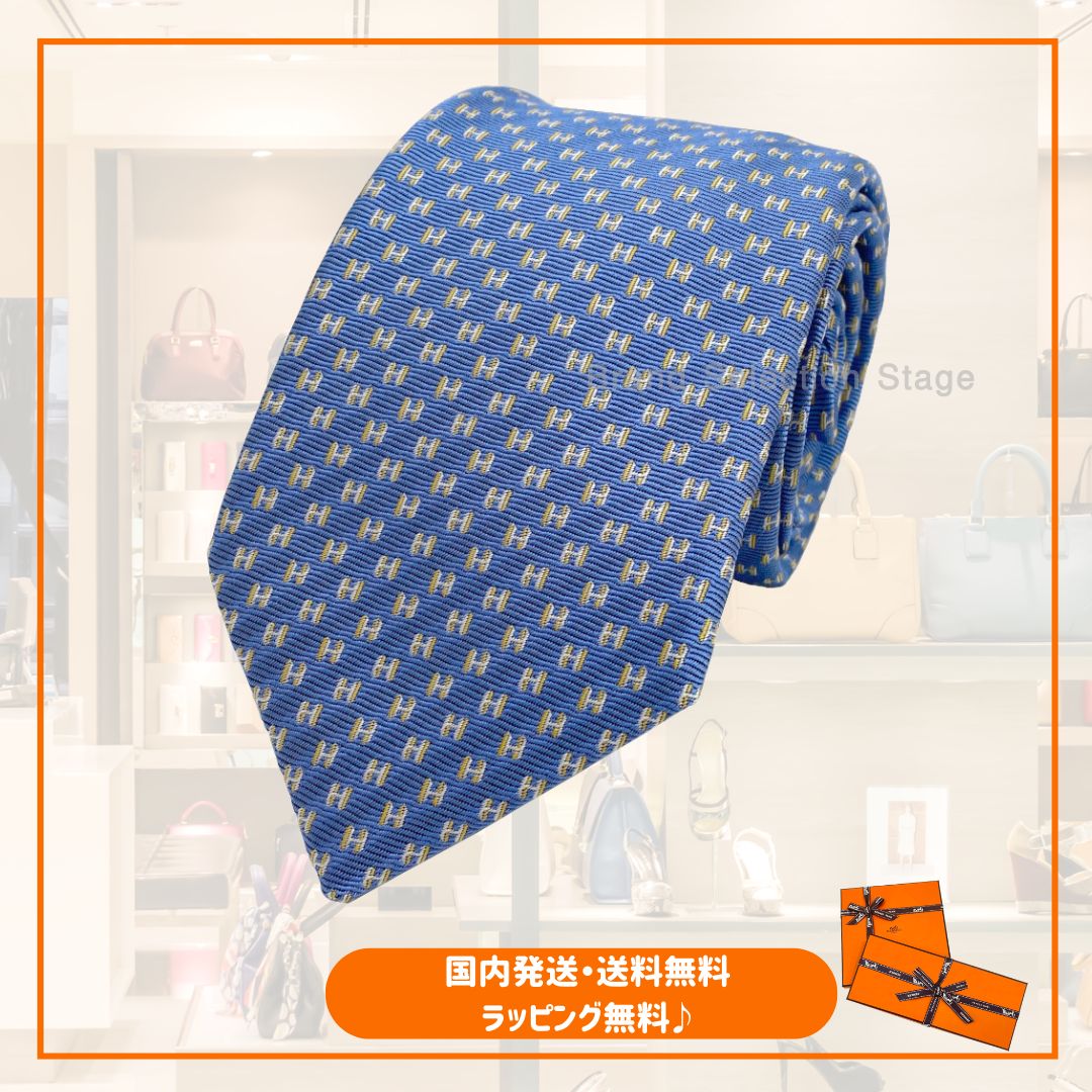 国内完売商品【新品】エルメス HERMES ネクタイ ヘヴィシルクタイ 7cm《 FLAMBOYANT WEB 》CIEL / JAUNE / BLANC ブルー イエロー ホワイト 青 黄色 白 ギフト プレゼント 男性 メンズ H339320 T06