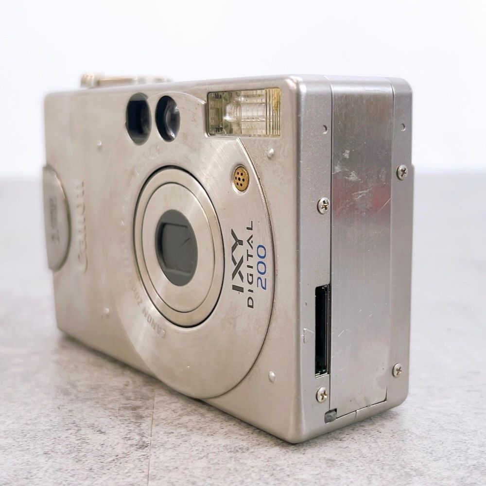 H-1394 Canon IXY DIGITAL 200 PC1012 シルバー ジャンク品 コンパクト
