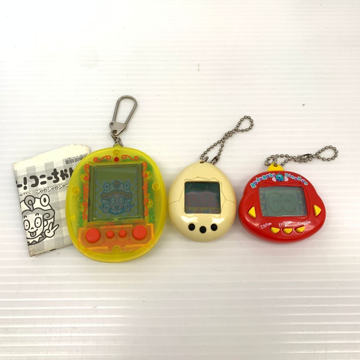 ジャンク 平成レトロ 初代 たまごっち 白ラクラク ダイノくん TK-910