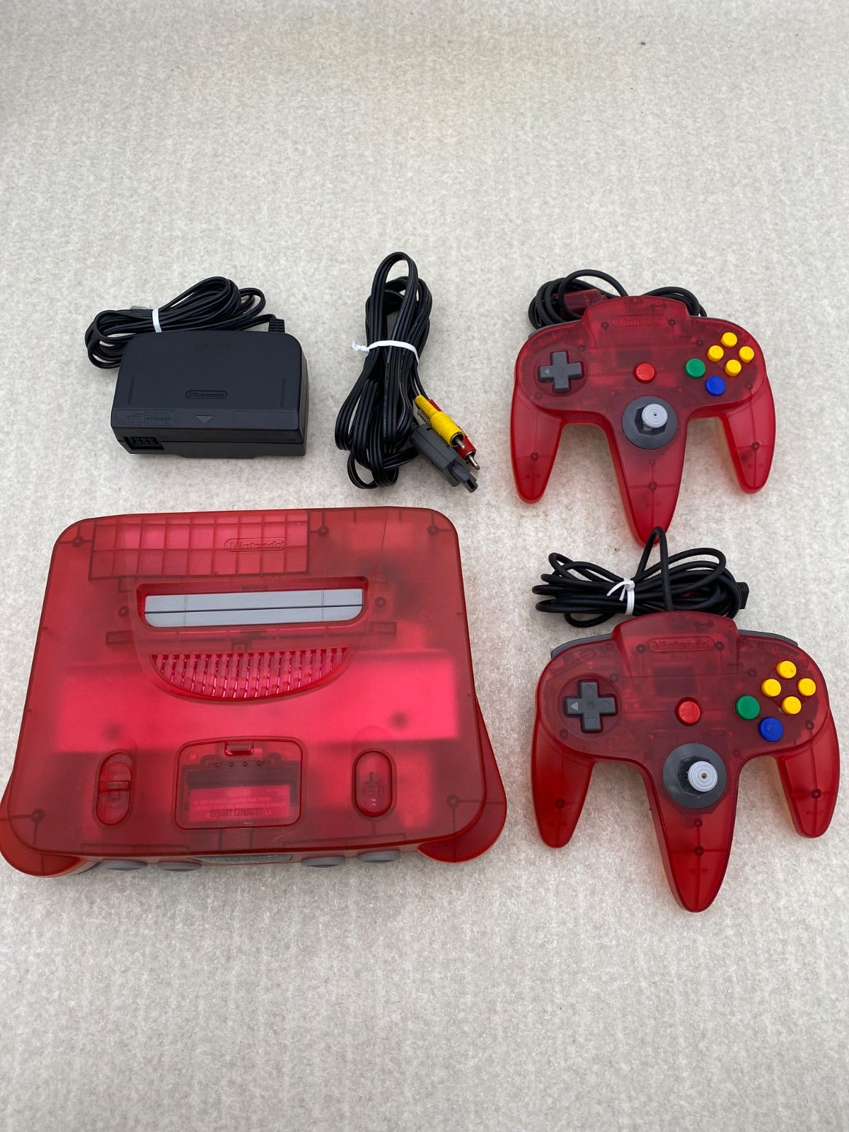 ニンテンドー64 本体 クリアレッド 動作品 コントローラー2点 - メルカリ