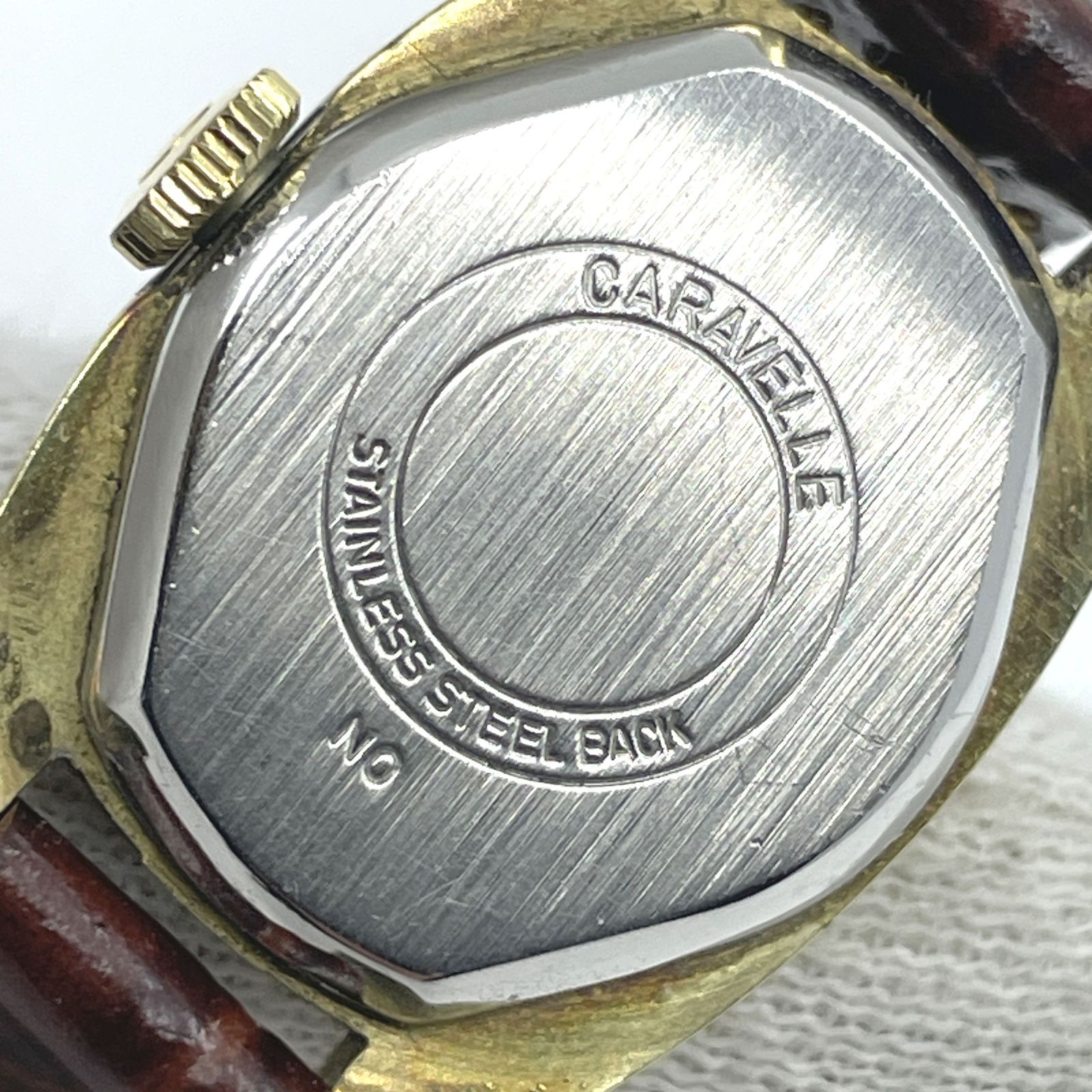 稼働〇 Caravelle 手巻き腕時計 ゴールド文字盤 オーバル レディース 
