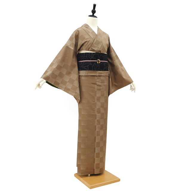 新古品】 本場大島紬 着物 大島紬 正絹 袷 横双 丁子染色 織り絣 市松