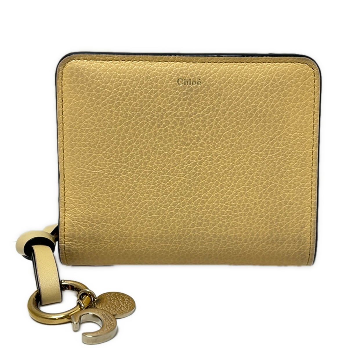 Chloe(クロエ) 2つ折り財布 アルファベット CHC22WP765F57752 アイボリー ラウンドファスナー レザー 10,792円