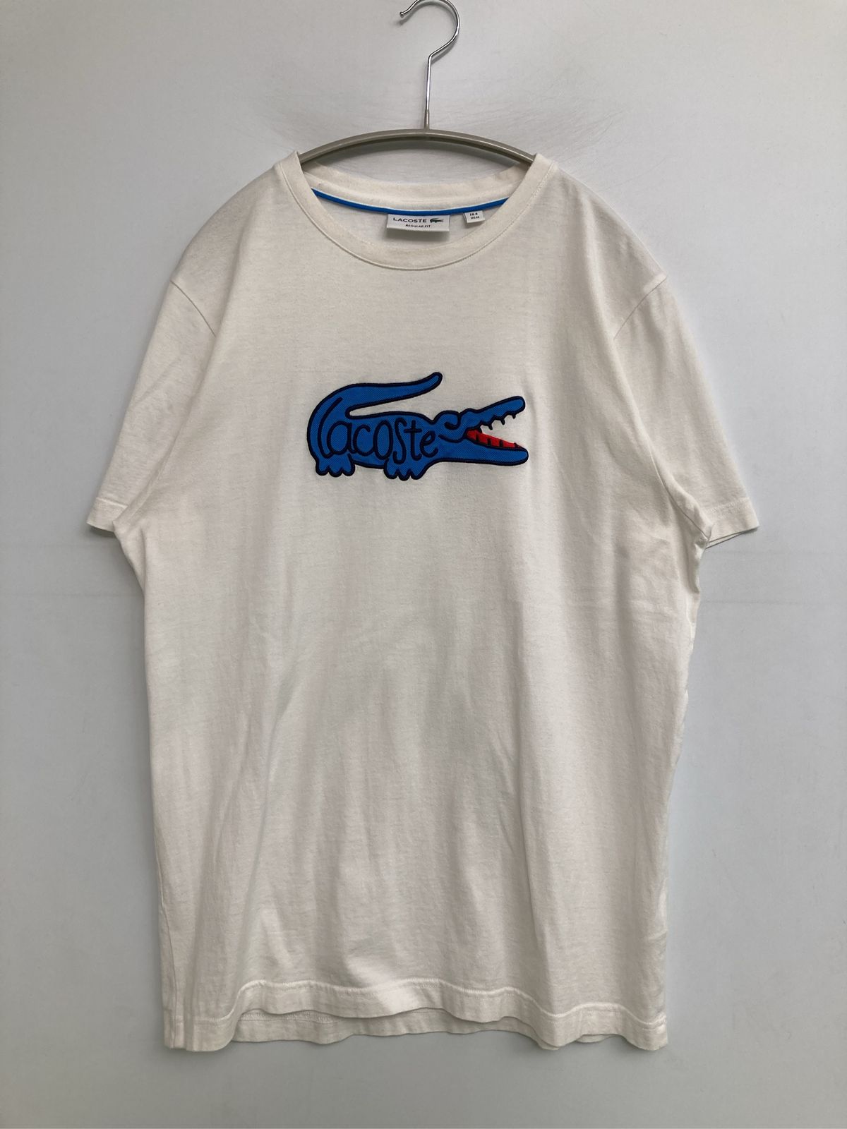 LACOSTE ラコステ Tシャツ/カットソー US M ホワイト 前面プリント ブランドロゴ ミドル丈 半袖 クルーネック(丸首) メンズ