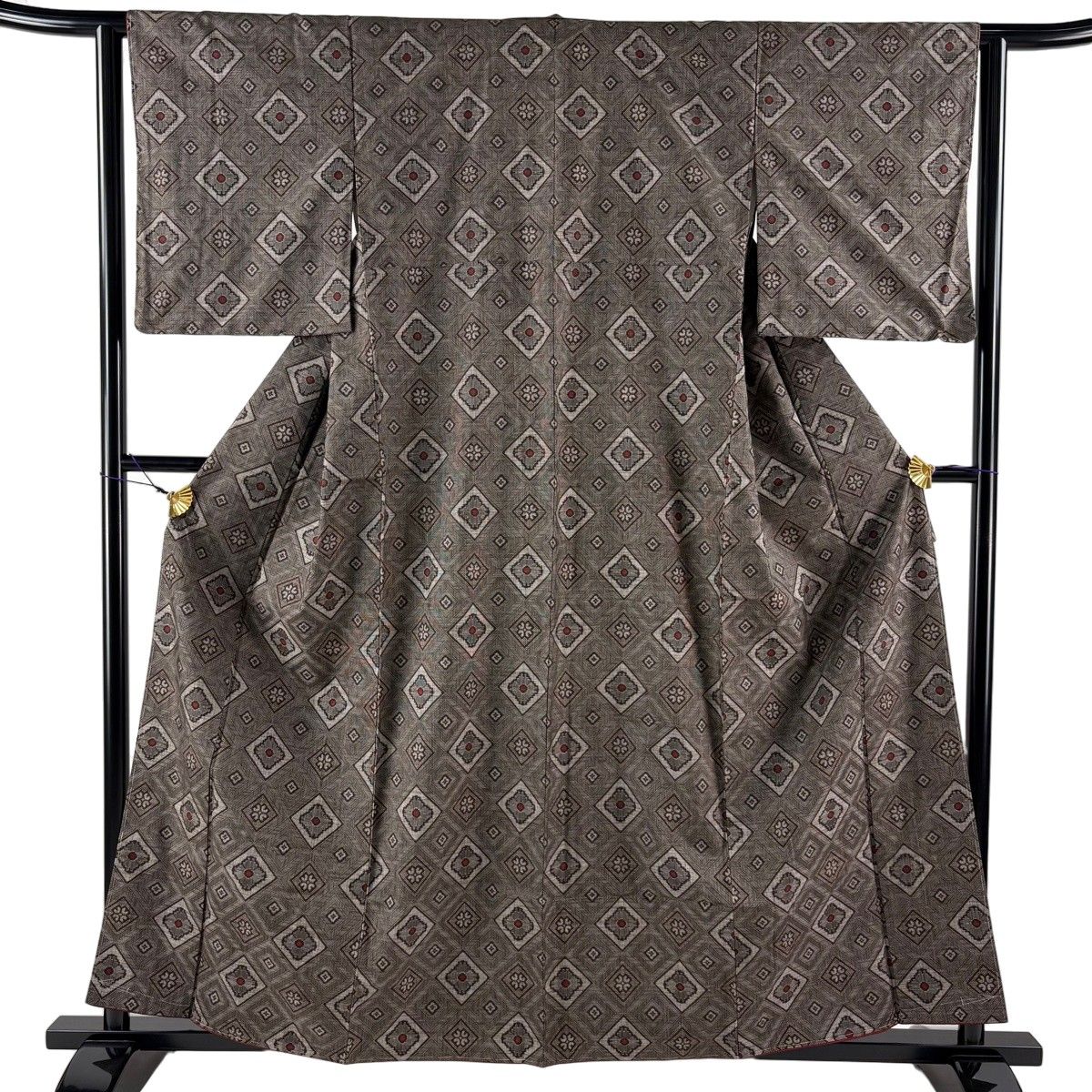 大島紬 身丈159.5cm 裄丈62.5cm S 袷 証紙 菱 花 焦茶色 正絹 逸品 【中古】
