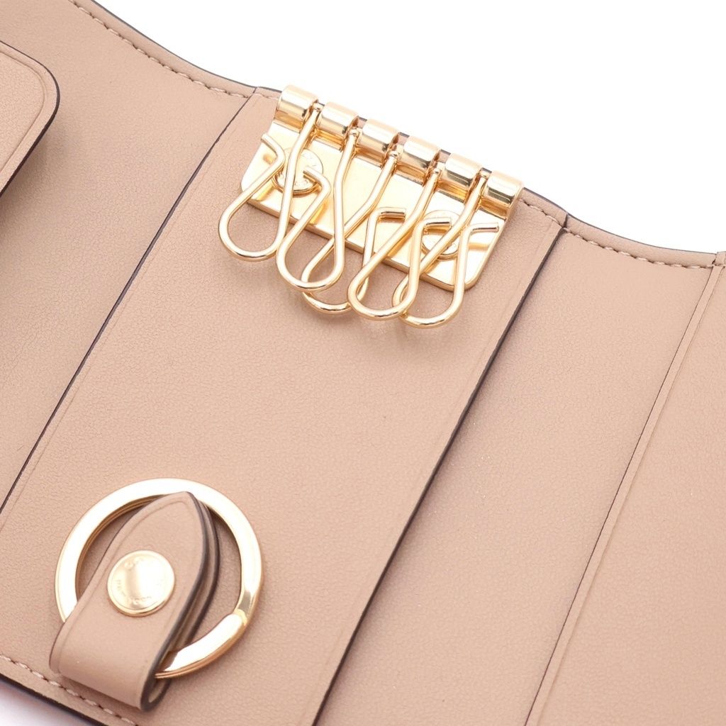 COACH (コーチ) フラワー総柄プリント PVC レザー キーケース ゴールド