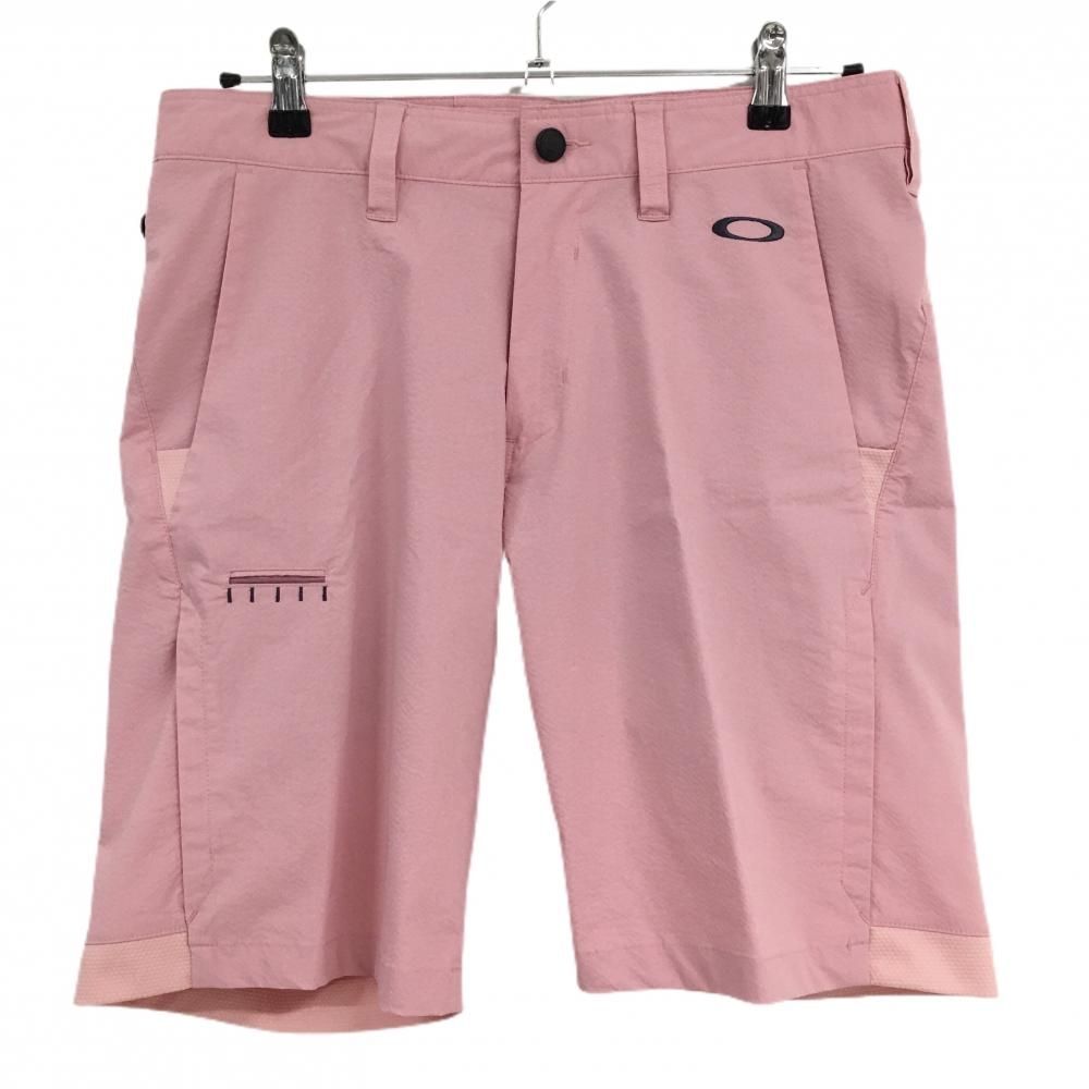 【超美品】オークリー ハーフパンツ ピンク ロゴグレー ティー装着可 ストレッチ メンズ 32 ゴルフウェア Oakley