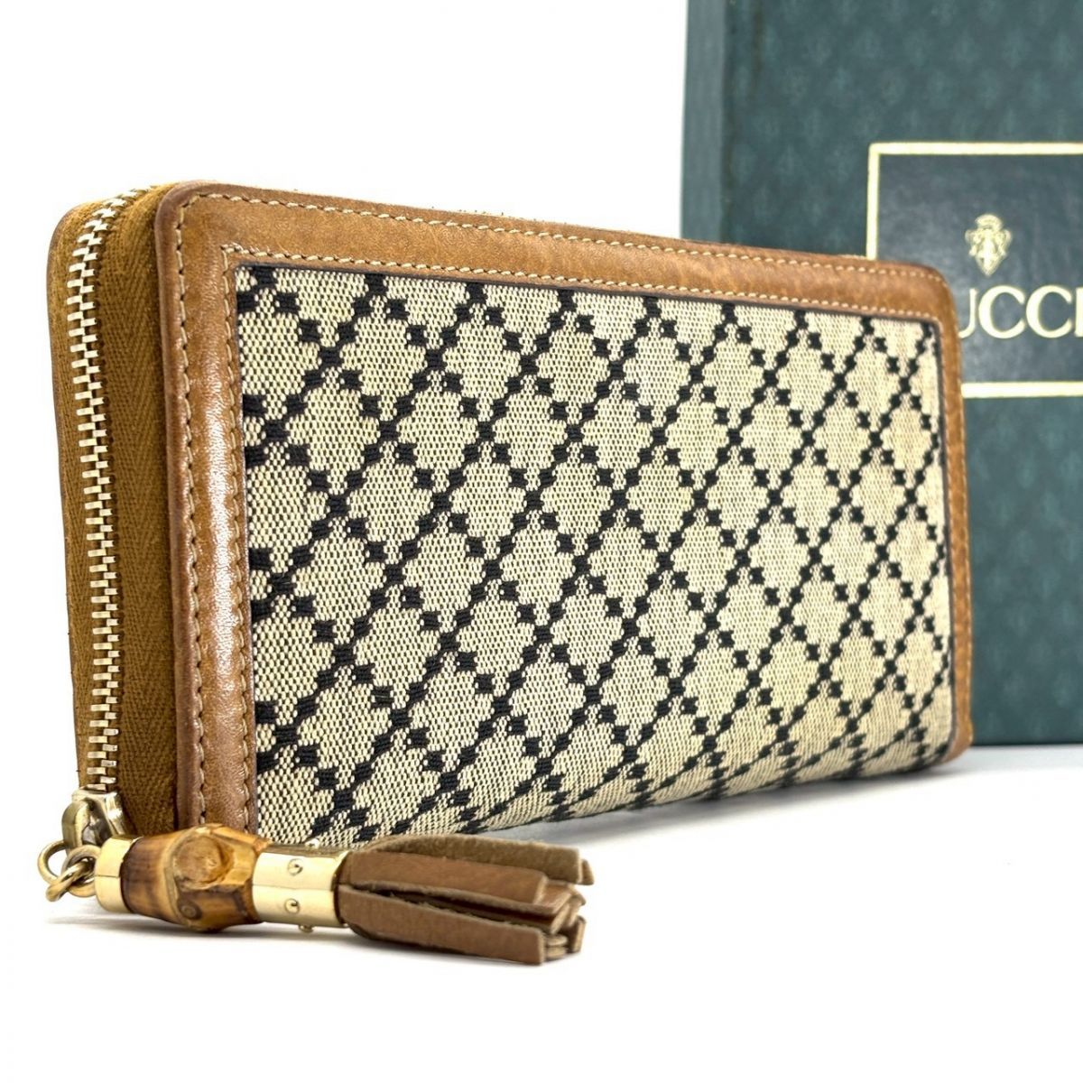 【無骨に滲むヴィンテージ】　 GUCCI　長財布 バンブー タッセル ディアマンテ キャンバス レザー ラウンドファスナー　ブラウン 14,024円