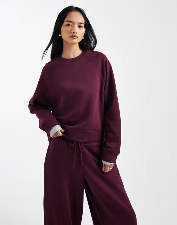 エイソス レディース アウター パーカー・スウェット シャツ ASOS DESIGN oversized brushback sweatshirt with raglan detail in plum プラム 8,954円