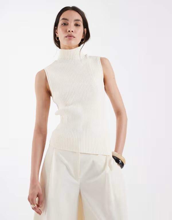 エイソス レディース トップス タンクトップ アシンメトリー ハイネック ニット ASOS DESIGN fine knit high neck asymmetric hem top in cream クリーム