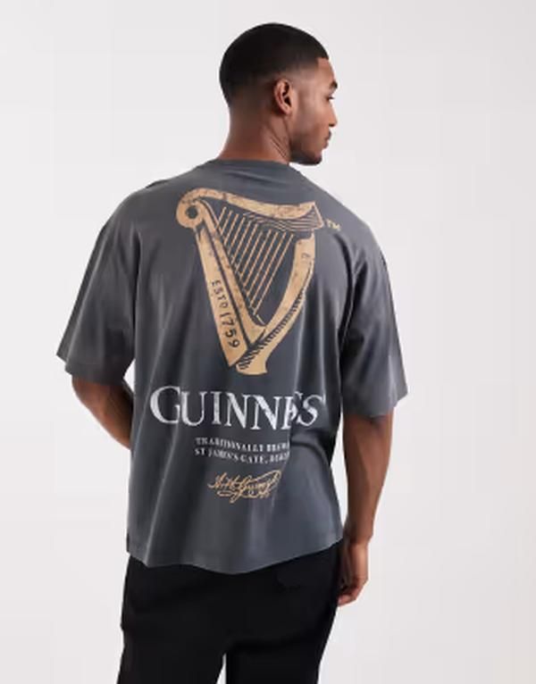 エイソス メンズ トップス Tシャツ プリント ASOS DESIGN oversized tee with Guinness print in washed BLACK ブラック