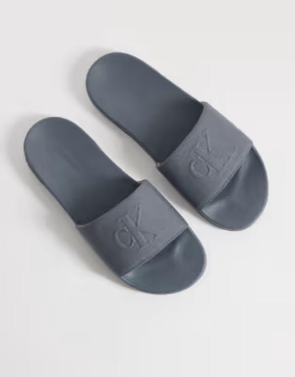 カルバンクライン メンズ シューズ サンダル Calvin Klein essential monogram slides Turbulence グレー