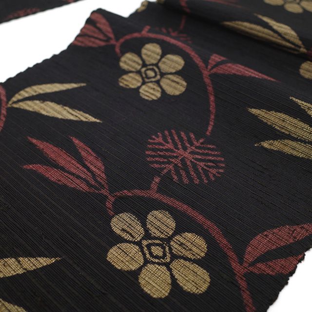 新古品】 名古屋帯 八寸 米沢 正絹 紬 全通 米澤 黒こげ茶 縞 笹蔓文様