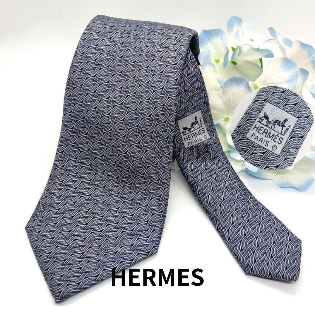 【美品✨】HERMES エルメス ネクタイ リング 総柄 幾何学模様 シルク100% グレー ネイビー 馬車ロゴ織ネーム フランス製 メンズ 高級 ヴィンテージ 1036