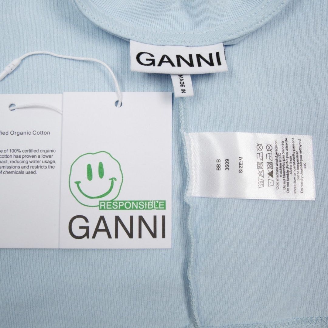 【大人気】GANNIガニー フローラルスマイルTシャツ オーガニックコットン