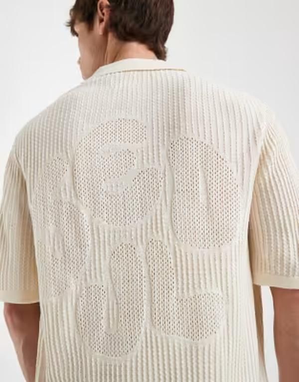 エイソス メンズ トップス ポロシャツ ニット ASOS DESIGN oversized knit short sleeve crochet notch neck polo shirt with Seoul embroidery in stone ストーン