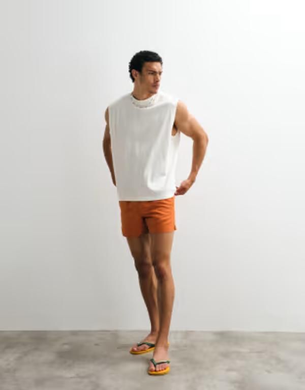エイソス メンズ トップス ベスト グラフィック ASOS DESIGN oversized tank with limoncello graphicoconut milk オフホワイト