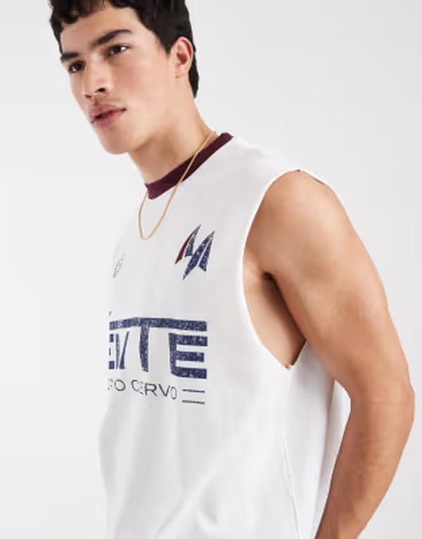 エイソス メンズ トップス ベスト グラフィック ASOS DESIGN oversized tank with soccer graphic WHITE ホワイト