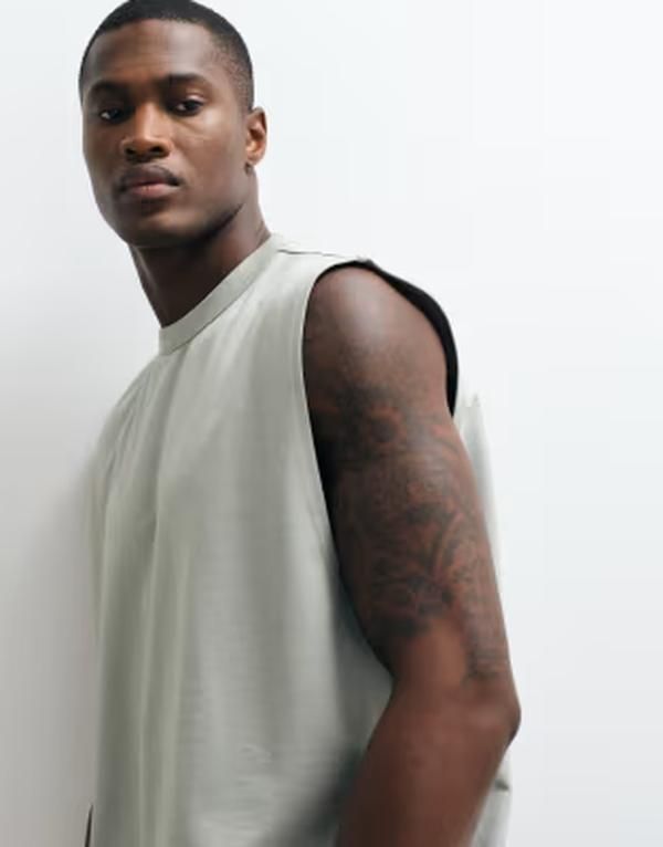 エイソス メンズ トップス ベスト コットン ASOS DESIGN breatheMAX heavyweight oversized tank in light green cotton blend Wrought iron グリーン