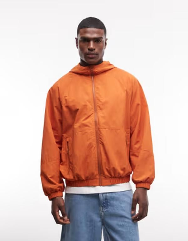 エイソス メンズ アウター ジャケット・ブルゾン ASOS DESIGN stormMAX wateresistant packaway rain jacket in orange オレンジ