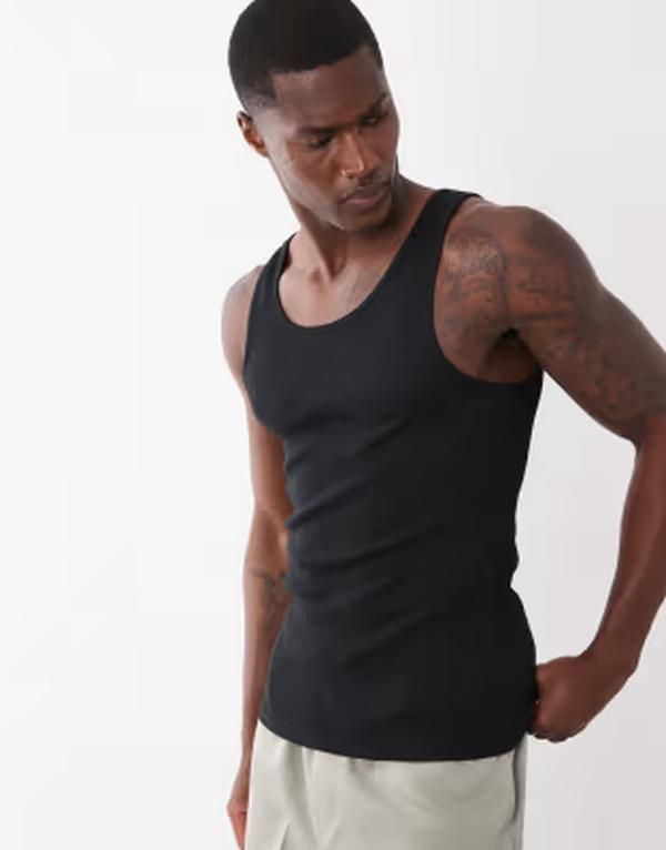 エイソス メンズ トップス ベスト リブ ASOS DESIGN muscle fit ribbed tank with mid scoop Black ブラック