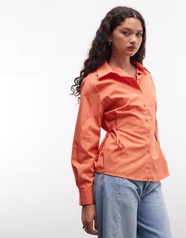 リクレイム ヴィンテージ レディース トップス シャツ タイディテール Reclaimed Vintage shirt with ruching adjustable fitted tie detail in sunset orange poplin Aper